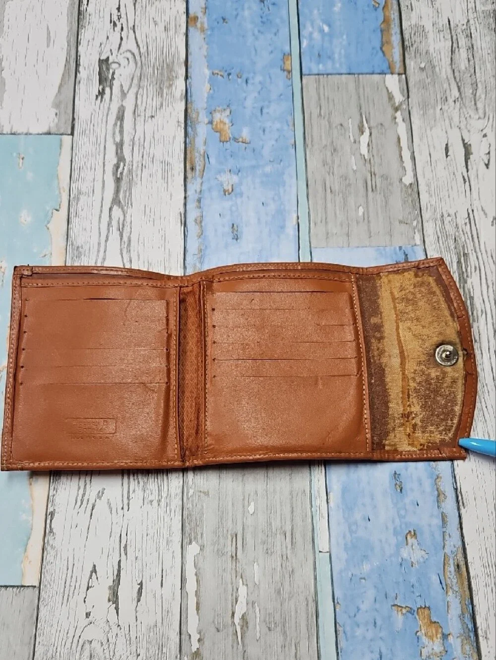 Vintage Dooney & Bourke All-Weather Leather compact wallet in hunter green/tan